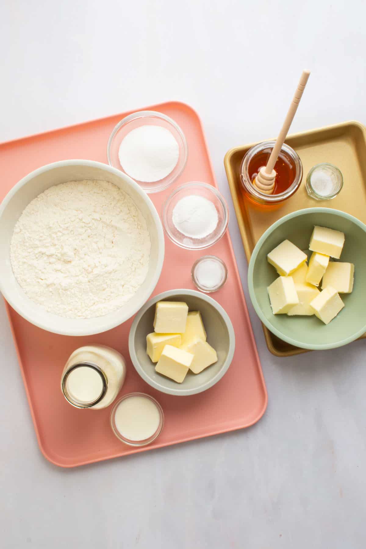 Ingredients for an easy scones recipe and homemade honey butter.