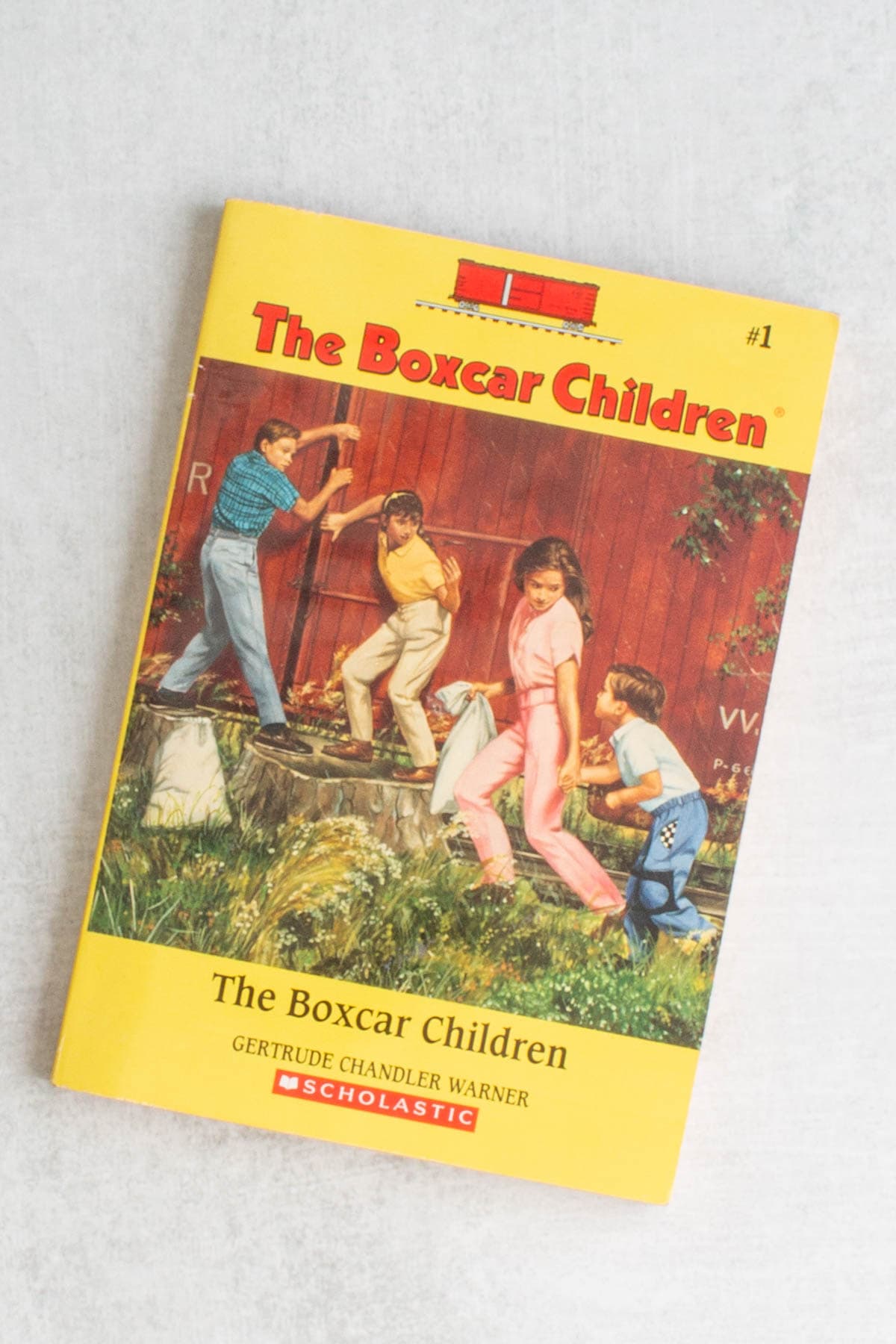 The modern cover of the book The Boxcar Children.