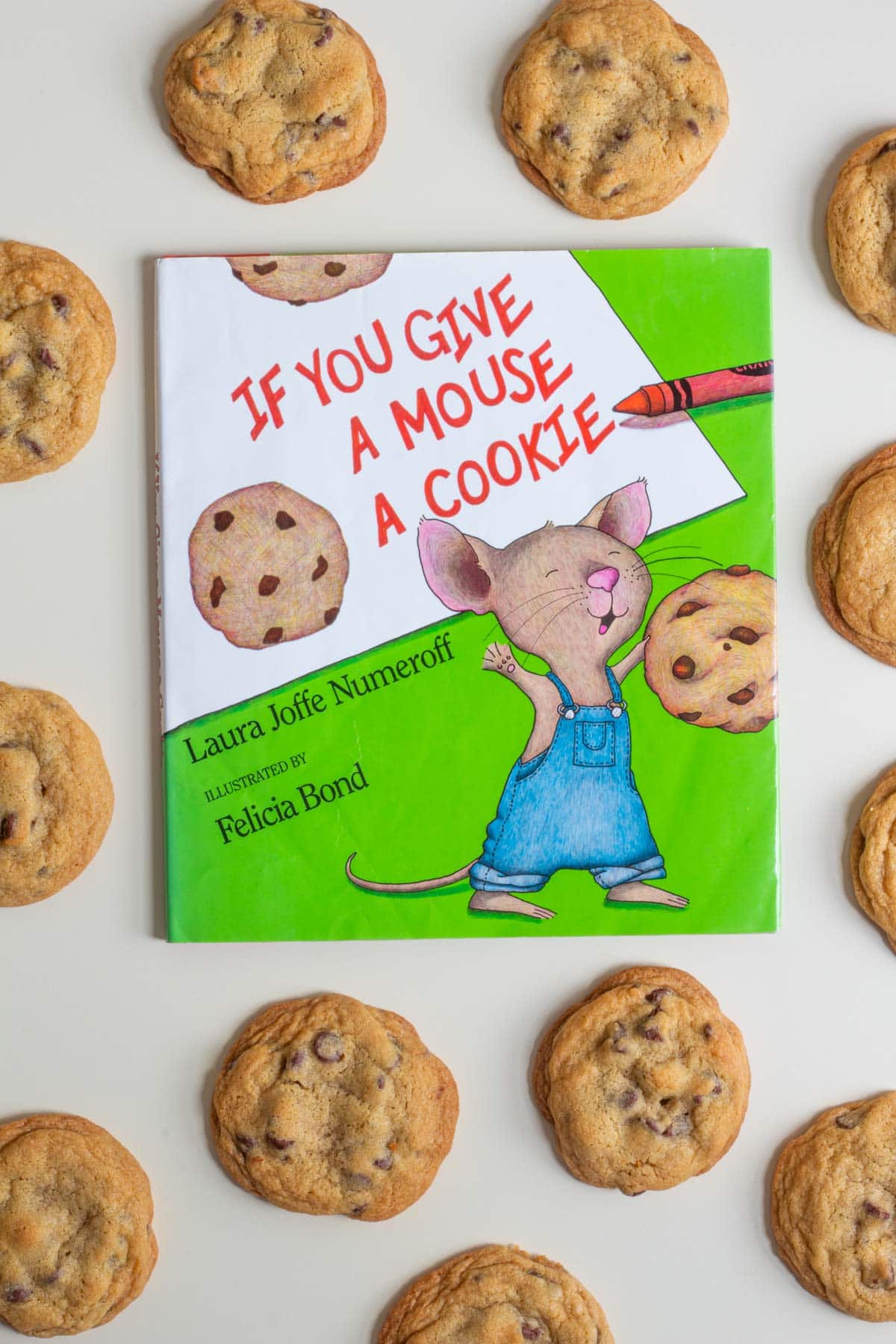 The book cover of "If You Give a Mouse a Cookie" surrounded by baked small-batch chocolate chip cookies.