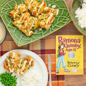 The cover of the book "Ramona Quimby, Age 8" next to a plate and a platter of Juicy Yogurt-Baked Chicken.