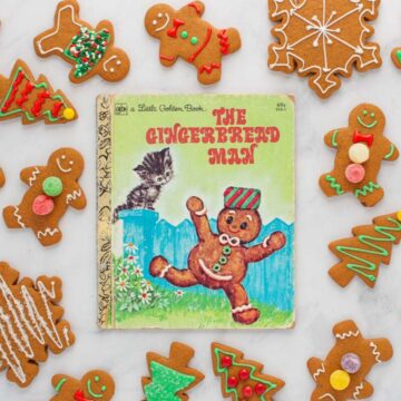 The cover of the book The Gingerbread Man, surrounded by baked and decorated gingerbread cookies.