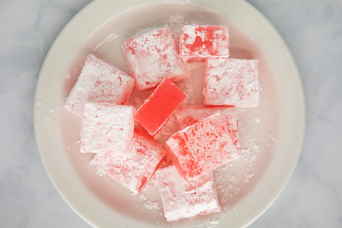 Pieces of Turkish Delight on a plate.