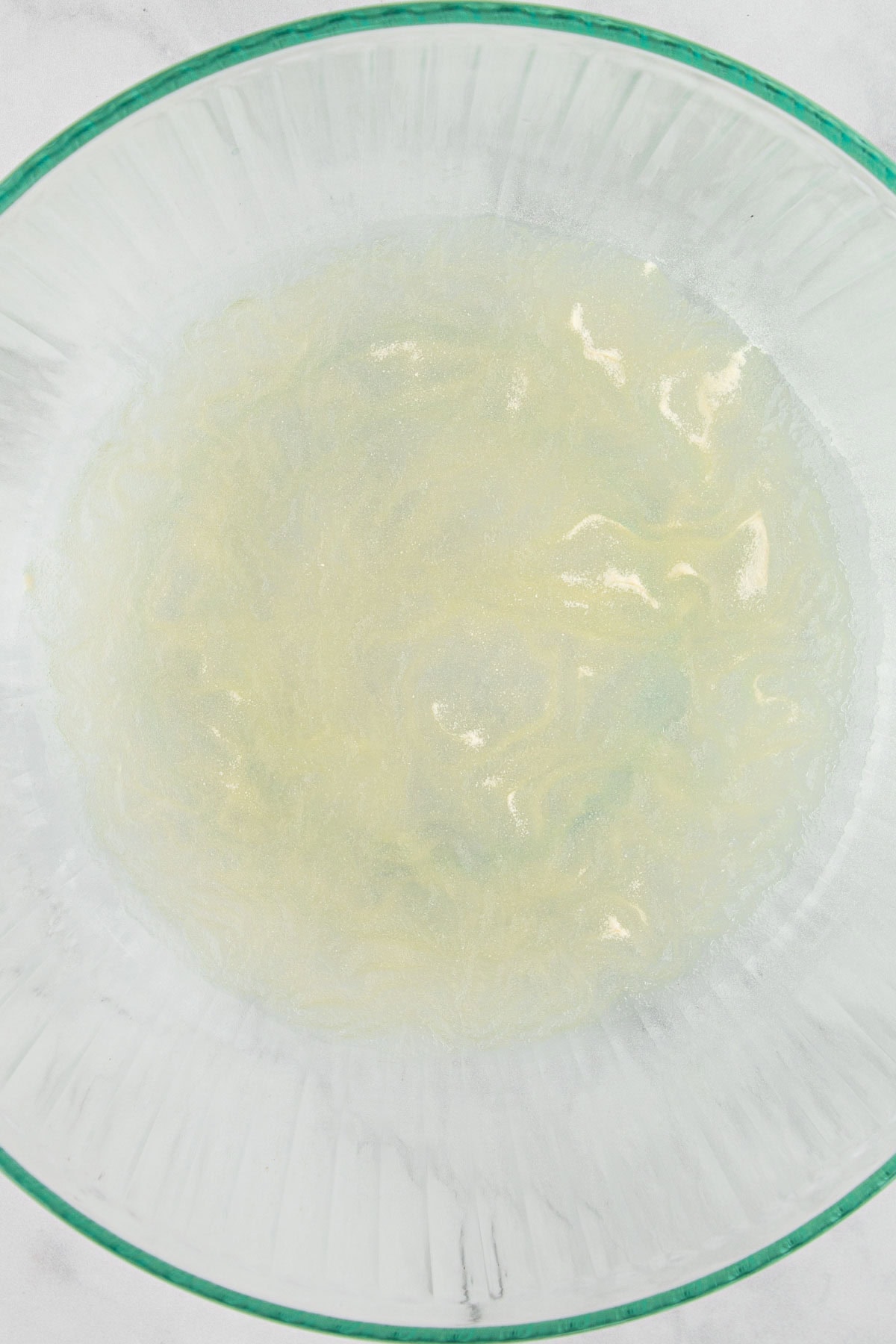 A bowl with bloomed gelatin in it.