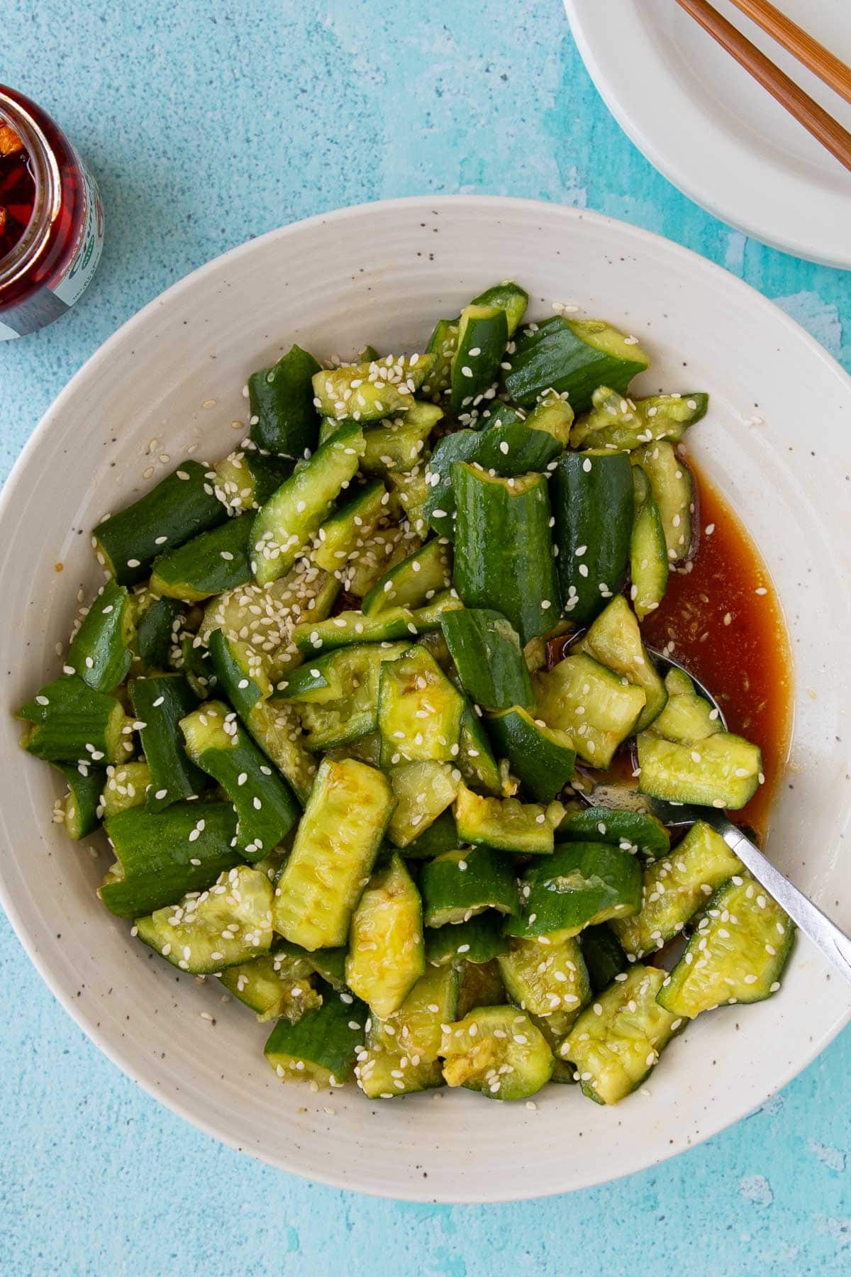 Smashed cucumber salad in a serving bowl.